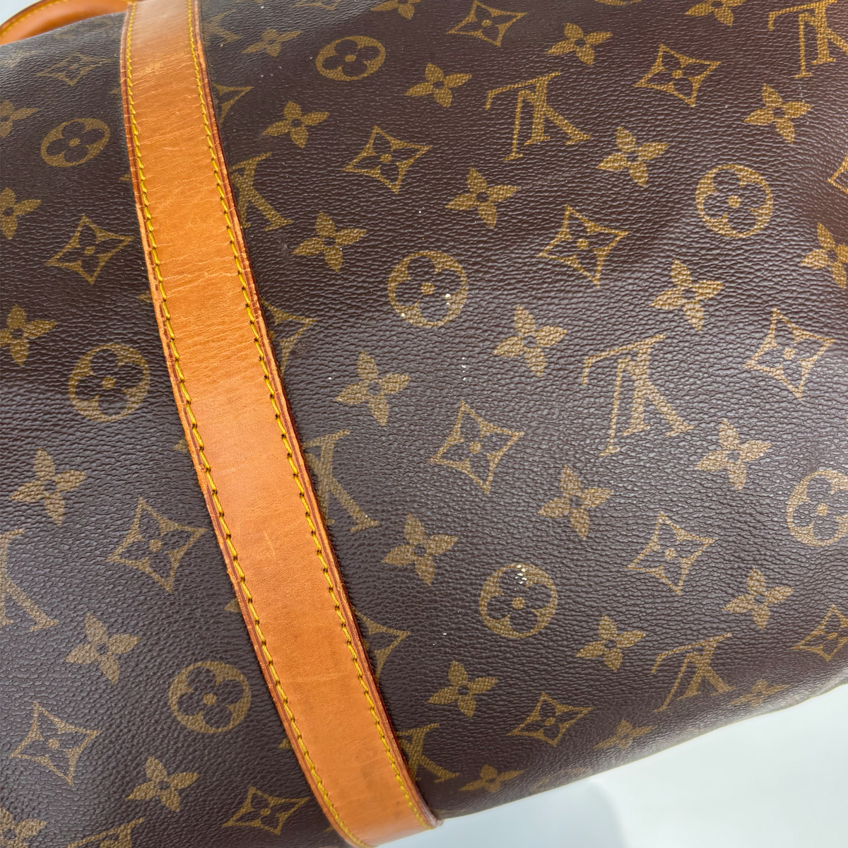 Surface marks on vintage Louis Vuitton Bandoulière 55 holdall