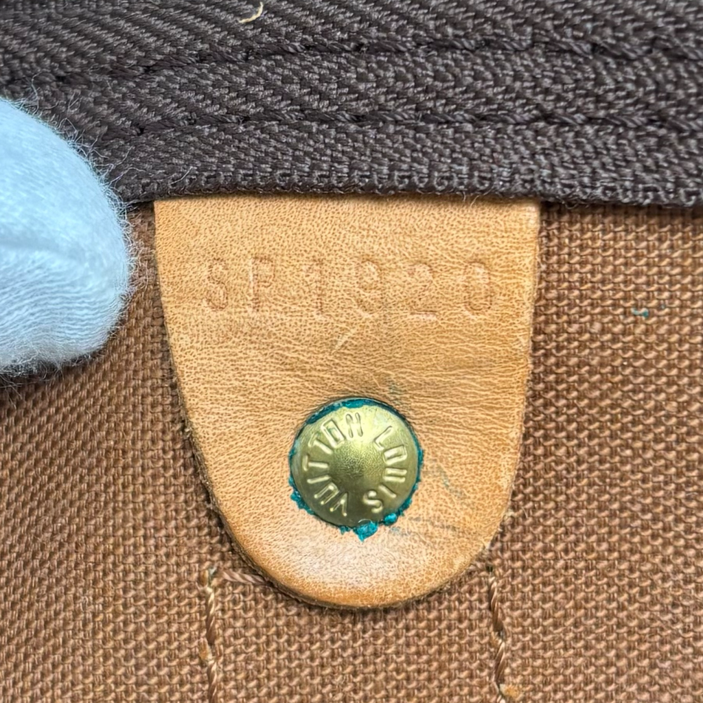 Date code SP1920 inside vintage Louis Vuitton Bandoulière 55 holdall