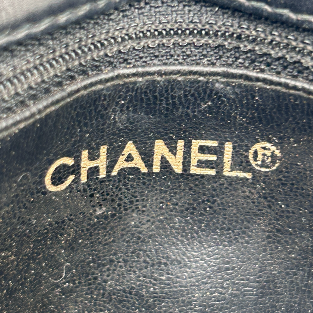 Chanel heat stamp inside vintage black Turnlock belt bag
