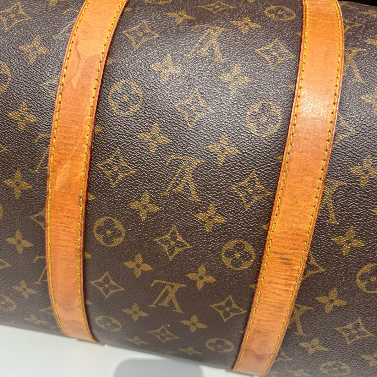 Additional marks on vintage Louis Vuitton Bandoulière 55 holdall