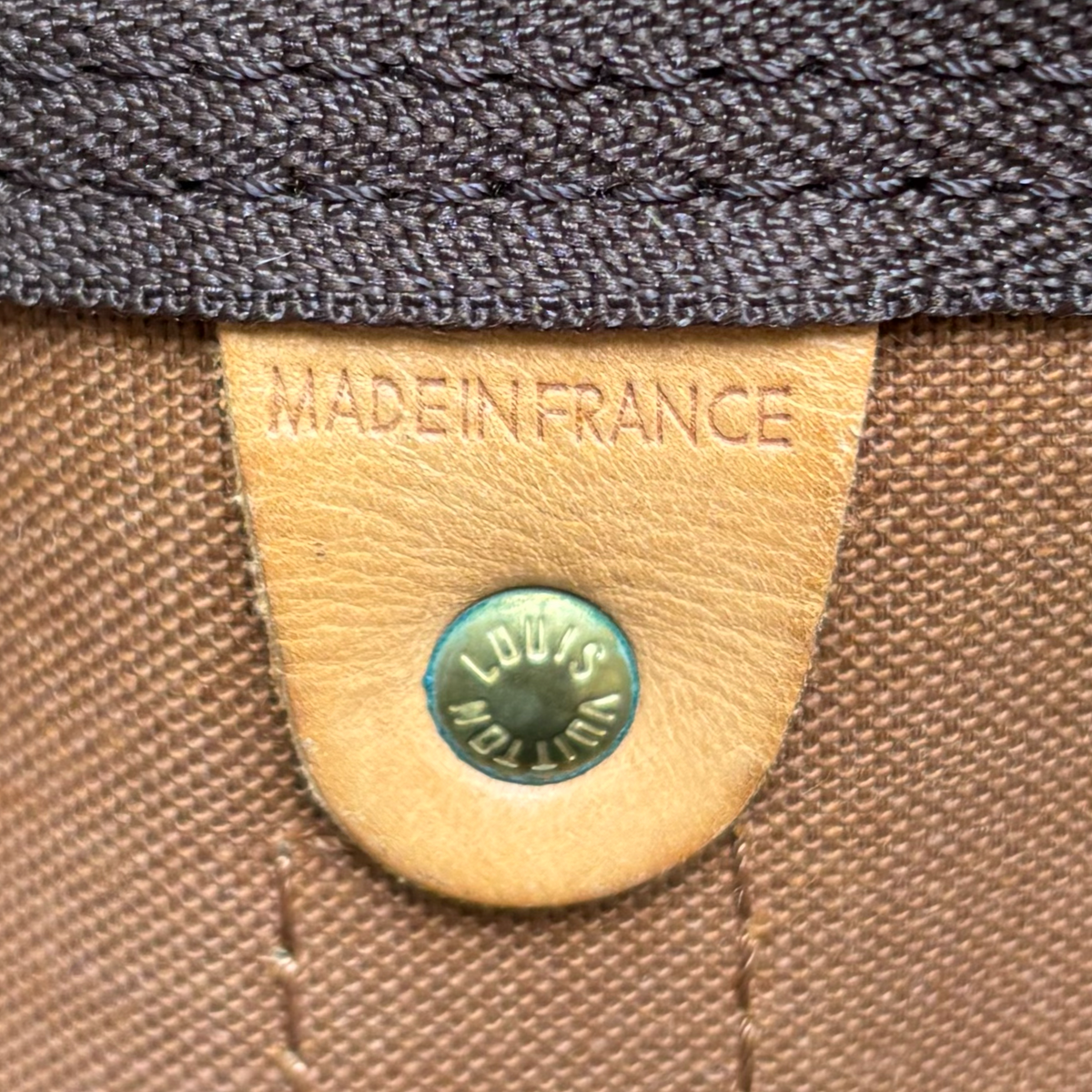 Louis Vuitton Made in France heat stamp inside vintage Bandoulière 55 holdall